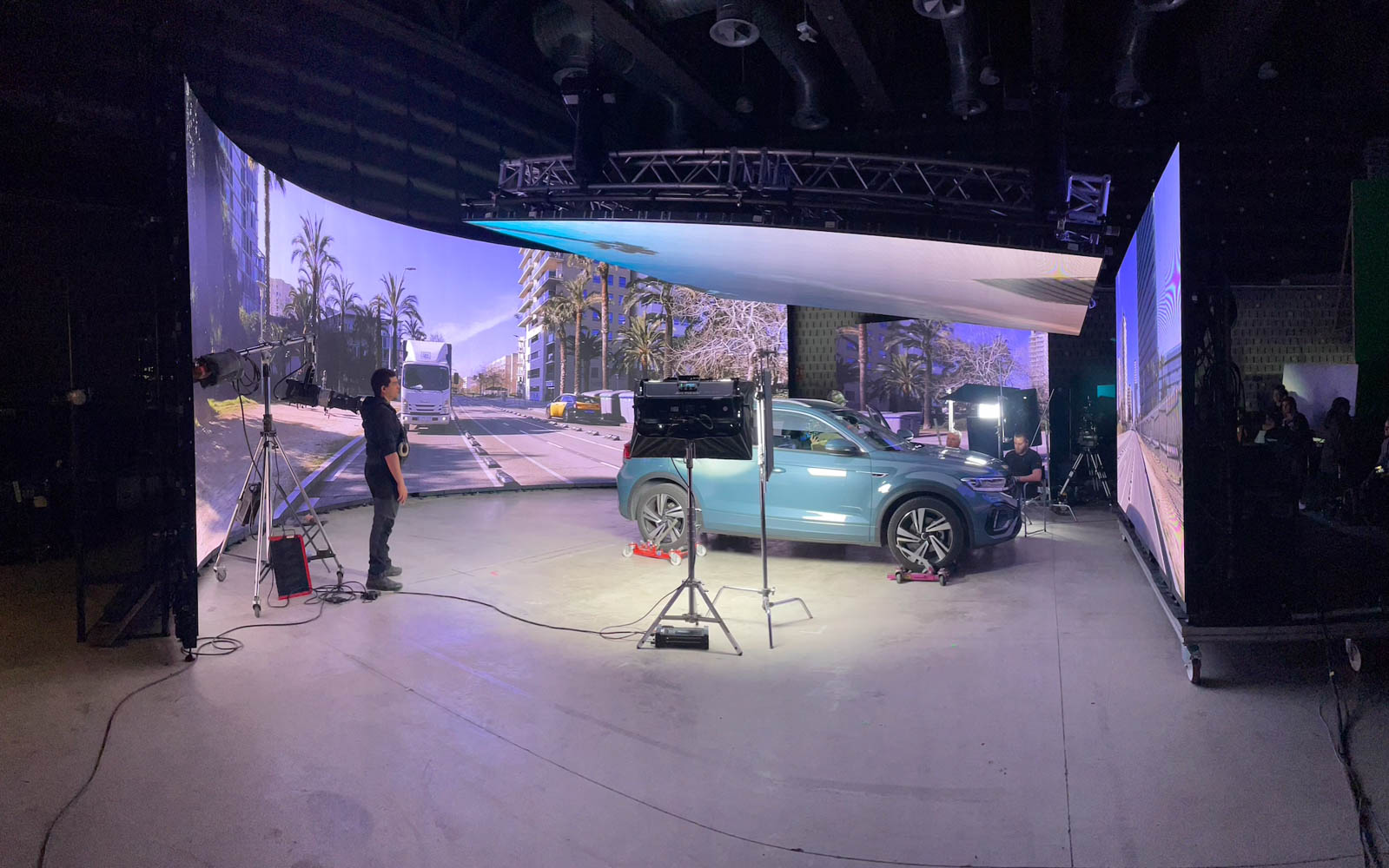 Wide view of an LED volume stage with an SUV, during a Glassy Films shoot